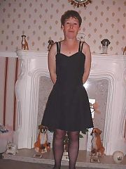 Photo 1, milf undressing fucking two
