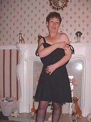 Photo 1, milf undressing fucking two
