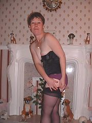 Photo 1, milf undressing fucking two