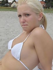 Photo 1, lighthaired teenager spreads ass
