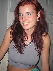 Photo 1, redheaded undresses shows