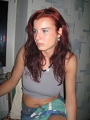 Redheaded undresses shows