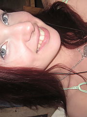 Photo 1, redheaded undresses shows