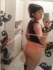 Photo 1, darkhaired shooting herself