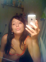 Photo 1, darkhaired shooting herself