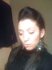 Photo 1, darkhaired shooting herself