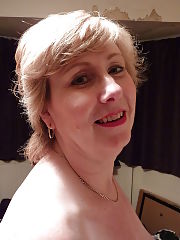 Photo 1, boobed milf playing twat