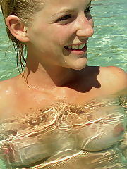 Photo 1, lighthaired exposing huge tits