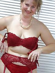 Photo 1, lighthaired milf stockings strips