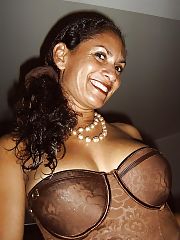 Photo 1, dark milf wanking sucking