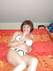 Photo 1, mature milf strips masturbating