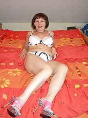 Photo 1, mature milf strips masturbating