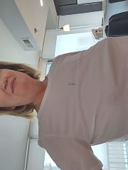 Photo 1, mature wife shows boobs