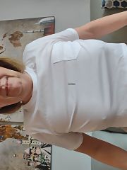 Photo 1, mature wife shows boobs