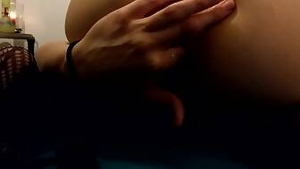 blackhaired fishnets playing ass