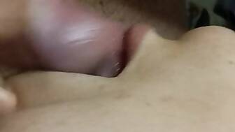 closeup sucks sperm tongue