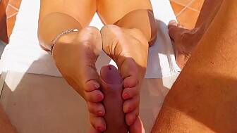 mature lighthaired wife footjob